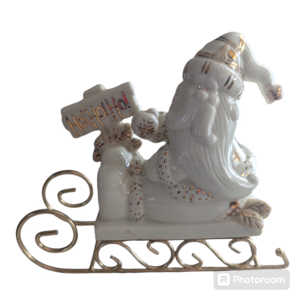Vintage Porcelain Christmas Ho! Ho! Ho! Santa On Sled Christmas Figurine.